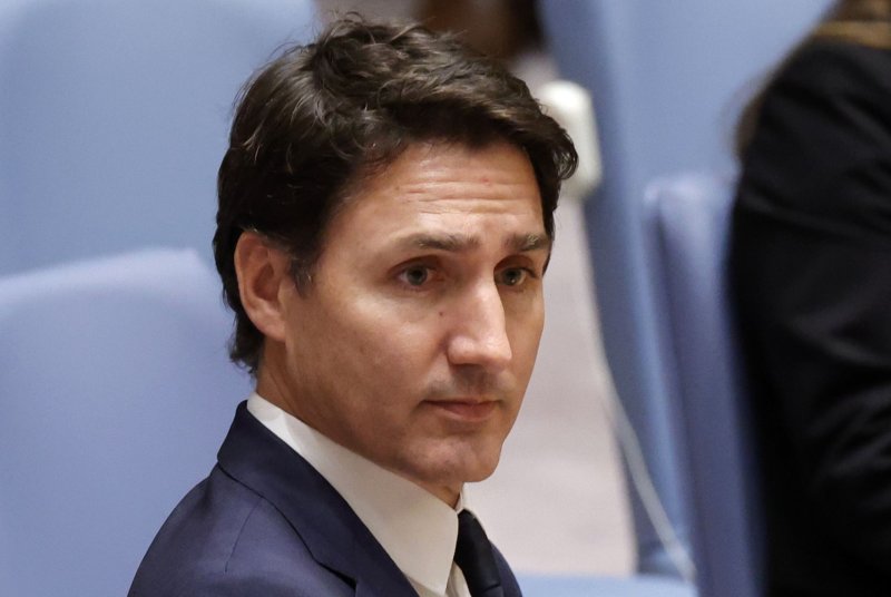 Canadian Prime Minister Justin Trudeau on Friday urged listeners to take seriously threats issued by U.S. President-elect Donald Trump to slap 25% blanket tariffs on Canadian imports. Such a move would hurt both countries' economies, he warned. File Photo by John Angelillo/UPI