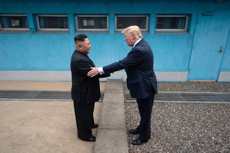 President Donald Trump shakes hands with Chairman of the Workers' Party of Korea Kim Jong Un on June 30, 2019, as the two leaders meet at the Korean Demilitarized Zone, but a similar meeting is in doubt as Trump prepares for a second term in office. White House File Photo by Shealah Craighead/UPI