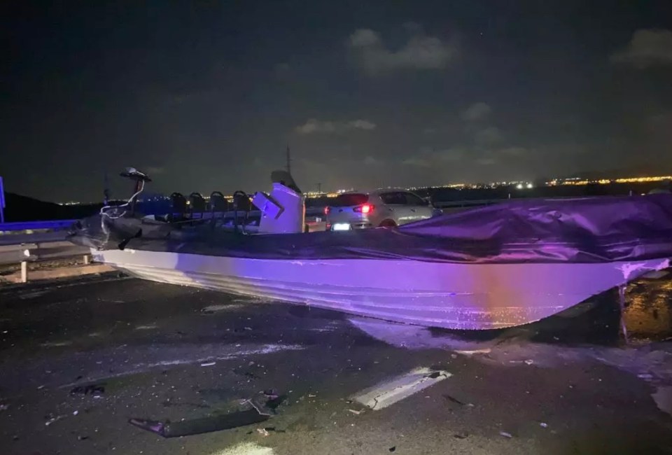 The speedboat after it had smashed into the car