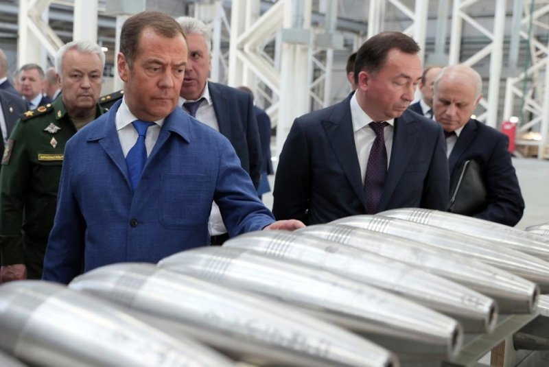 Deputy head of Russia's Security Council Dmitry Medvedev, left, visits the Aleksinsky Experimental Mechanical Plant in Aleksin, Tula, Russia, in 2023, which was among areas targeted by an overnight Ukrainian military drone attack. Photo by Katerina Shtukina/Government Press Service/Pool/EPA-EFE