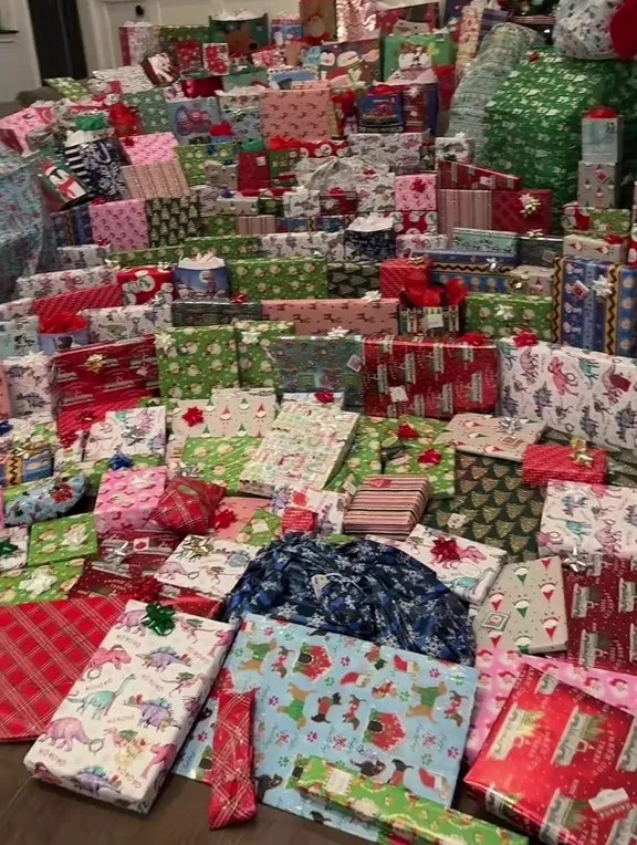 A mum showed off the mounds of presents she buys her kids