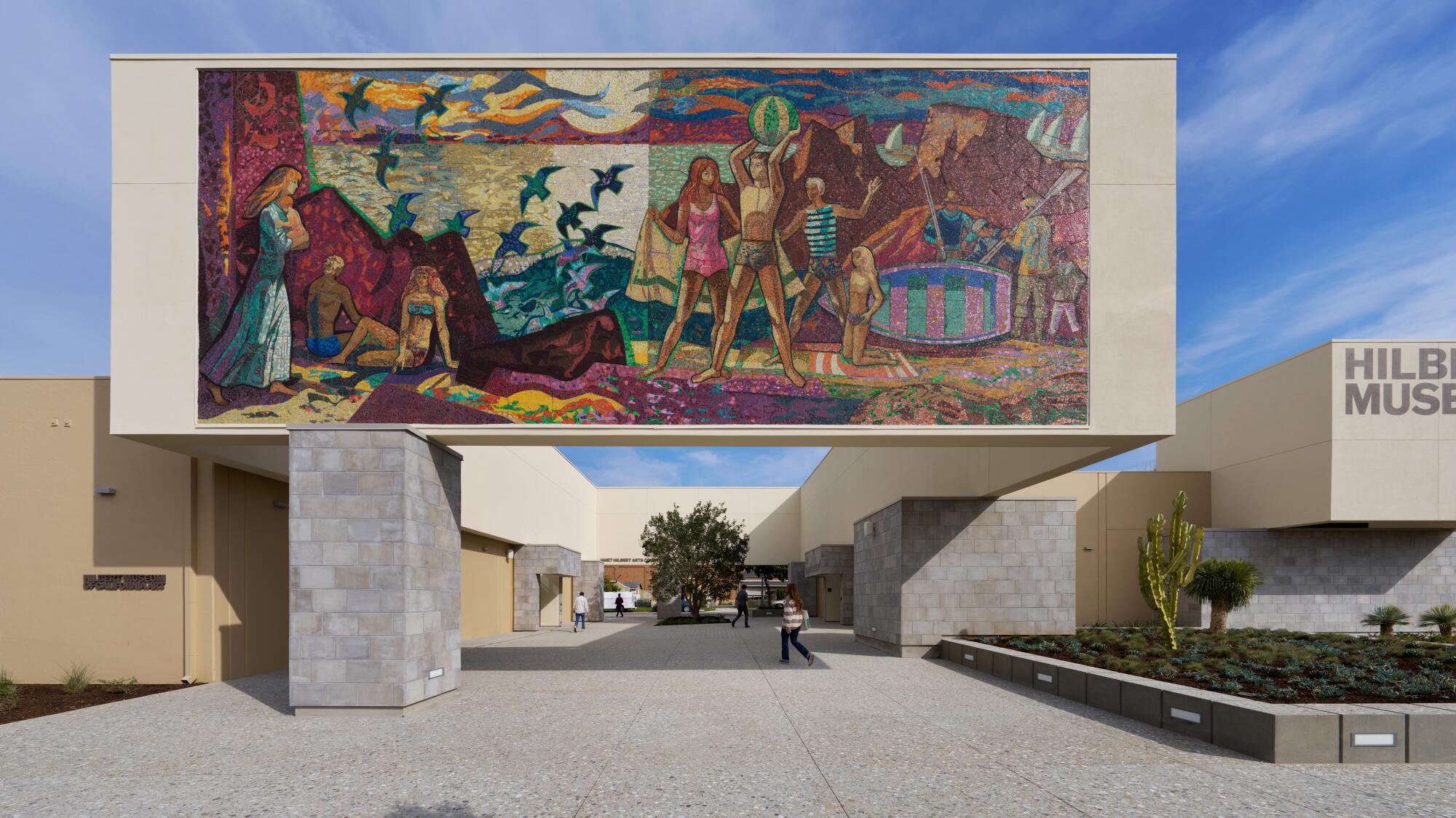 A mosaic by midcentury great Millard Sheets welcomes visitors to the Hilbert Museum of California Art.