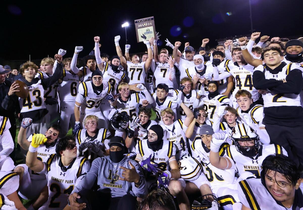 Newbury Park celebrates winning the Division 2 championship with 31-28 win over Murrieta Valley.