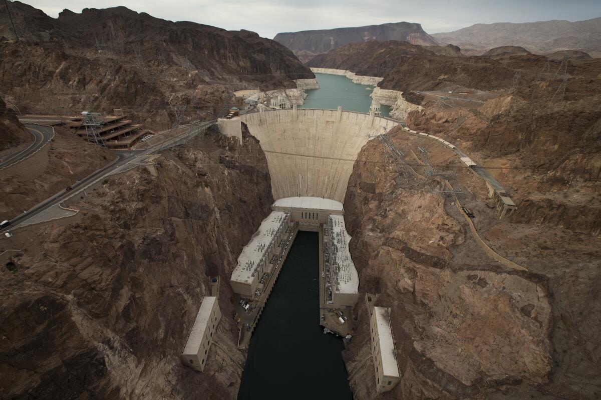 Hoover Dam stands in front of Lake Mead.