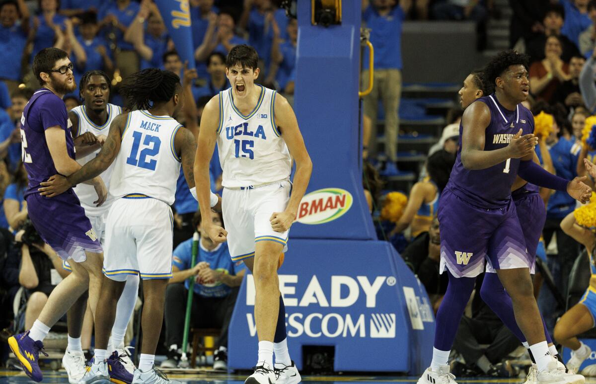 UCLA center Aday Mara celebrates after scoring against Washington in the first half Tuesday night.