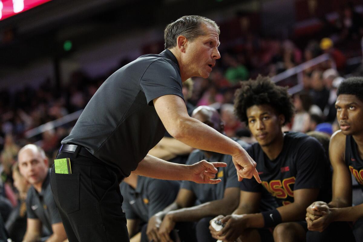 USC coach Eric Musselman talks to his team during the Trojans' loss to Oregon at Galen Center on Thursday.