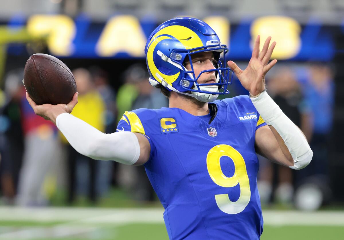 Rams quarterback Matthew Stafford warms up before playing the Philadelphia Eagles at SoFi Stadium.