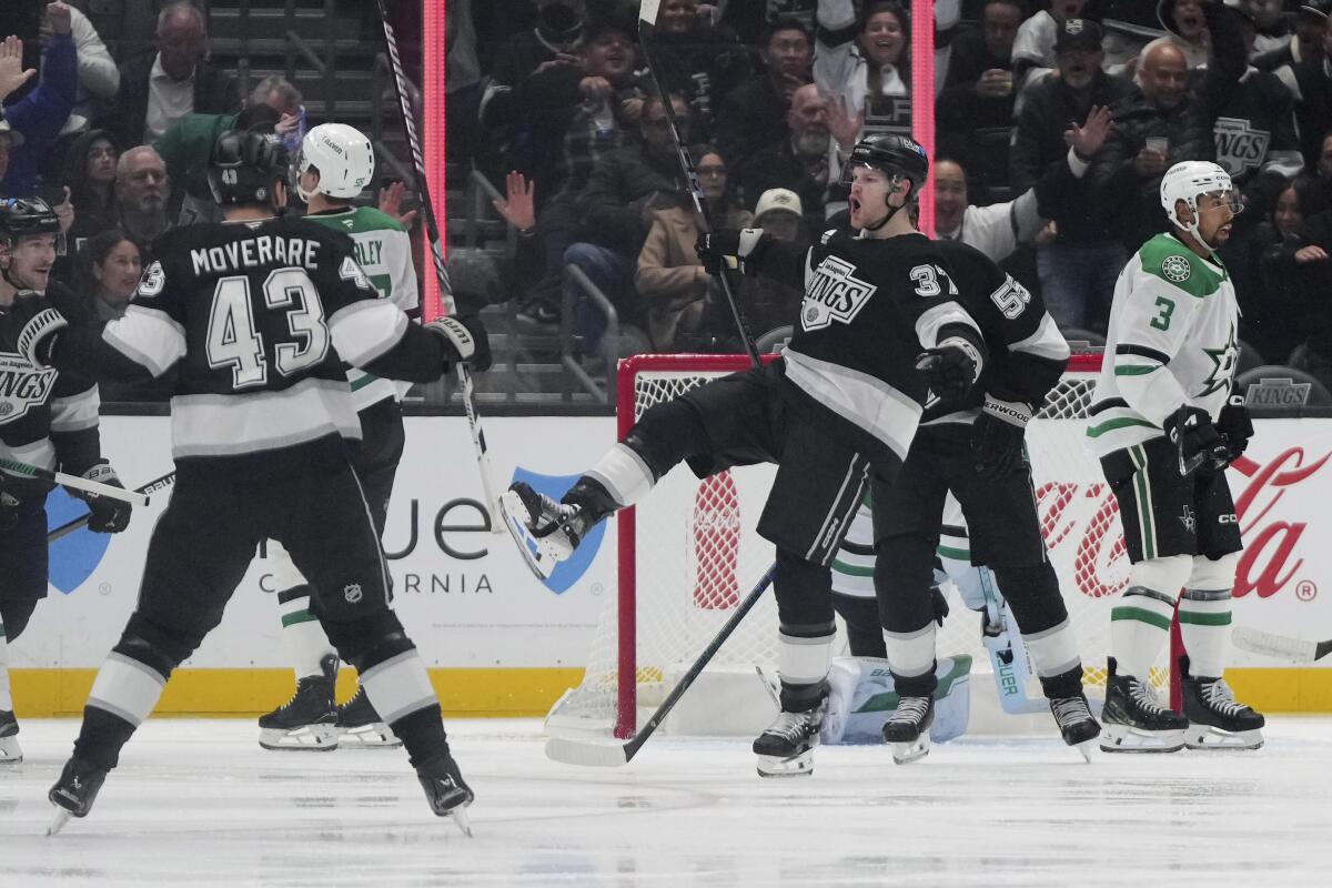 Kings forward Warren Foegele, center, celebrates after scoring against the Dallas Stars at Crypto.com Arena.