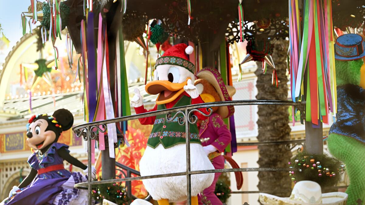 Donald Duck in a holiday sweater at Disney California Adventure.