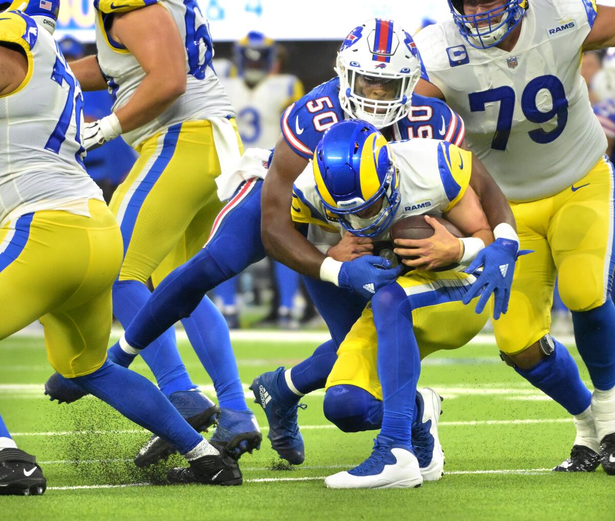 Rams quarterback Matthew Stafford is sacked by the Bills' Greg Rousseau in 2022.