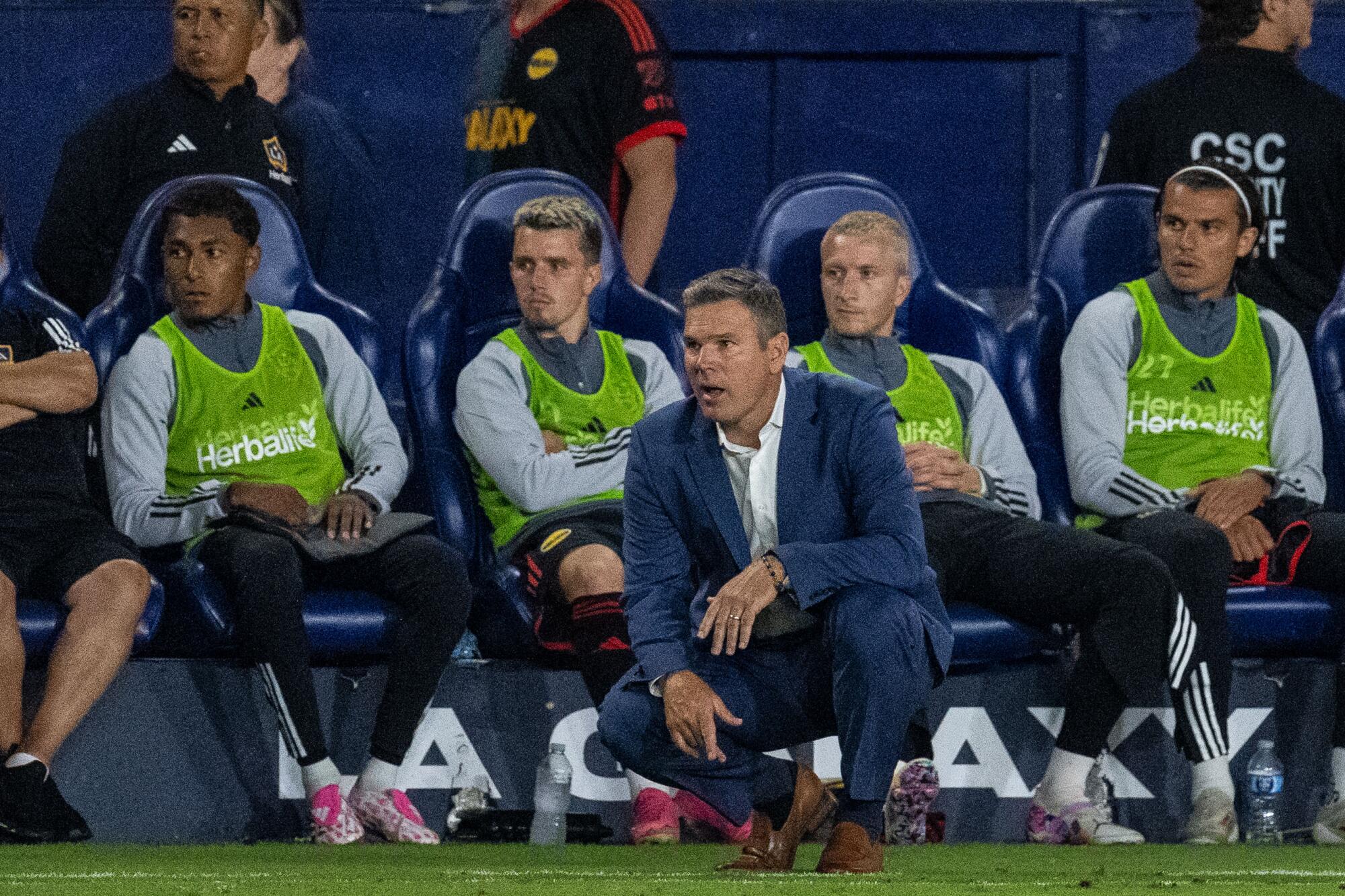 Galaxy coach Greg Vanney watches from the sideline during a match against Atlanta in August.