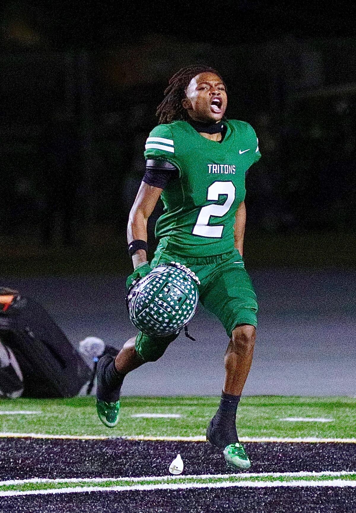 Oxnard Pacifica's Alijah Royster celebrates after scoring a touchdown against Narbonne.