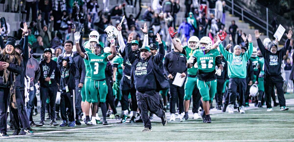 San Diego Lincoln celebrates 34-27 win over Newbury Park in Division 1-AA regional final.