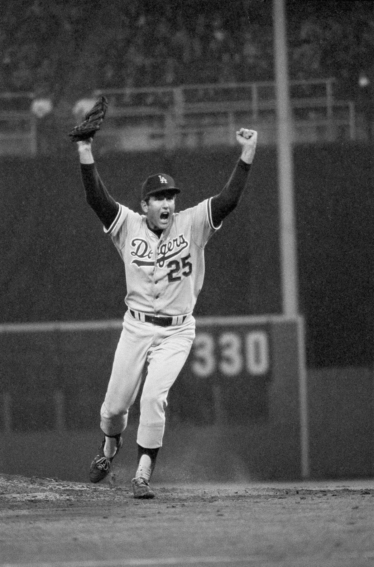 Dodgers pitcher Tommy John celebrates after the final out of 1977 National League Championship Series.