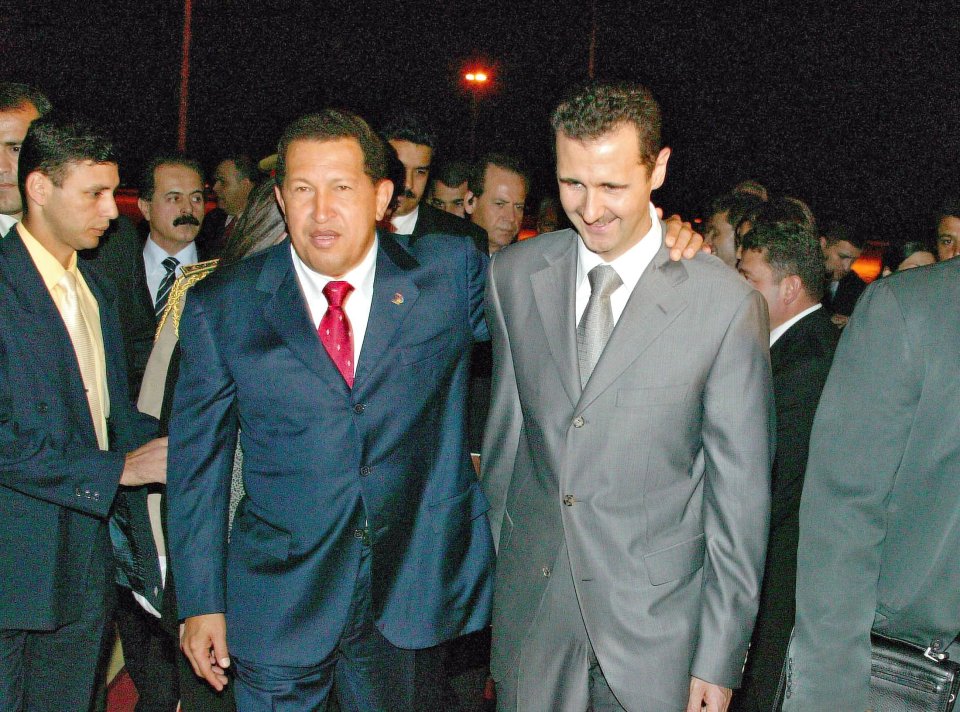 In power since 2000, Assad was close with fellow dictatorial leaders such as Hugo Chavez from Venezuela (left)