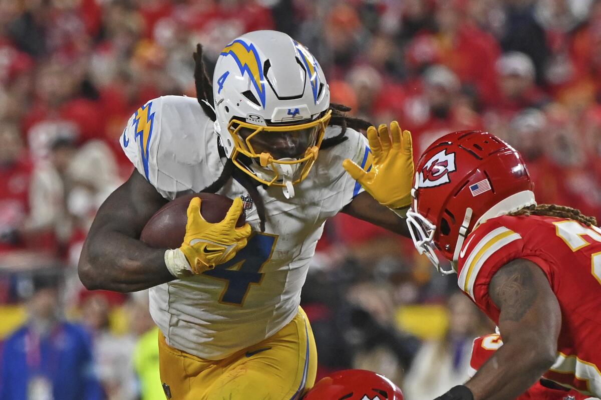 Chargers running back Gus Edwards led the team with 36 rushing yards and scored a touchdown Sunday against the Chiefs.