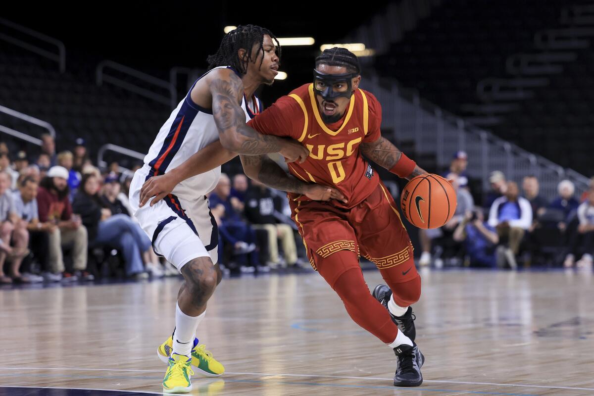 Saint Thomas drives against Gonzaga's Khalif Battle in October.