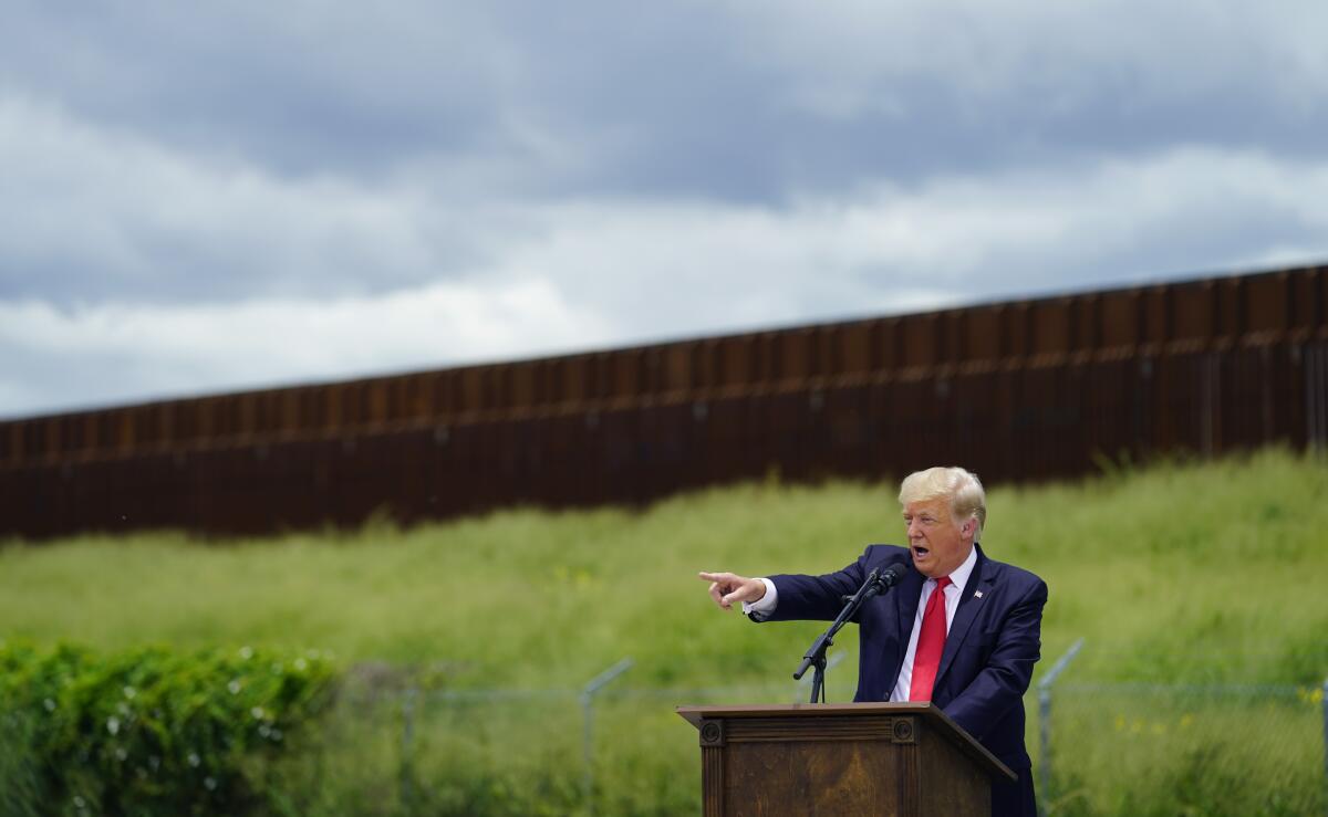 Donald Trump visits an unfinished section of the U.S.-Mexico border wall in Texas in 2021.