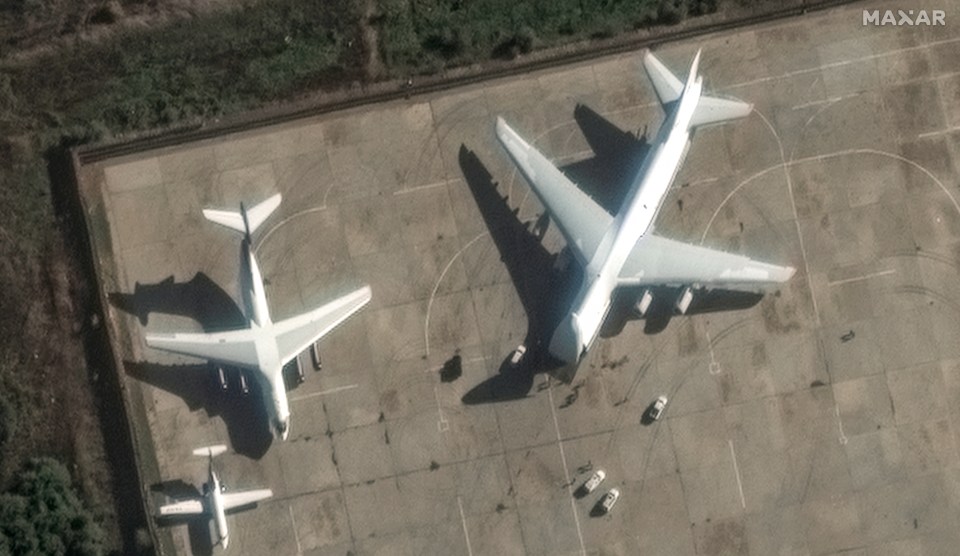 A satellite image shows An-124 heavy transport aircraft with its nose cone lifted, at Russian Khmeimim airbase