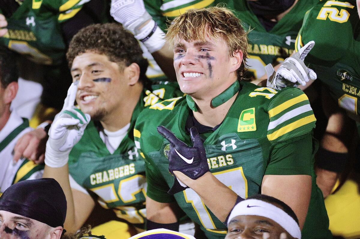 Edison wide receiver Jake Minter celebrates after scoring the winning touchdown.