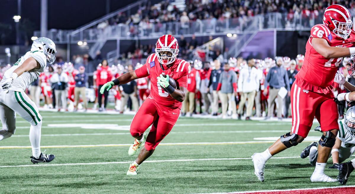 Mater Dei running back Jordon Davison heads to the end zone against De La Salle through a big hole in the offensive line.