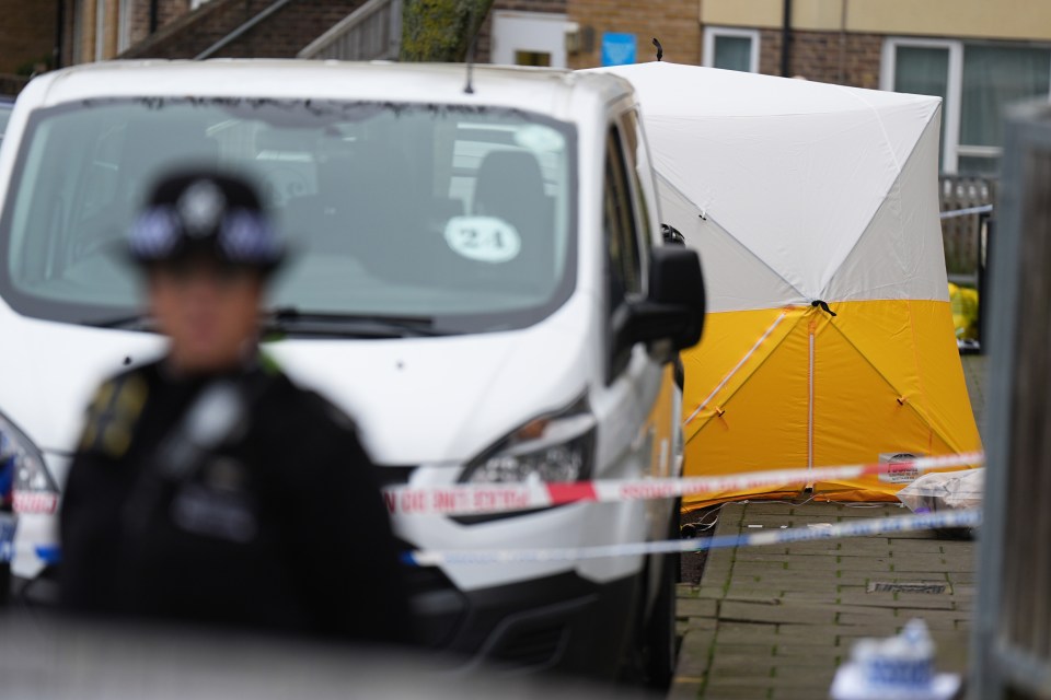 A police cordon remains in place on Sunday