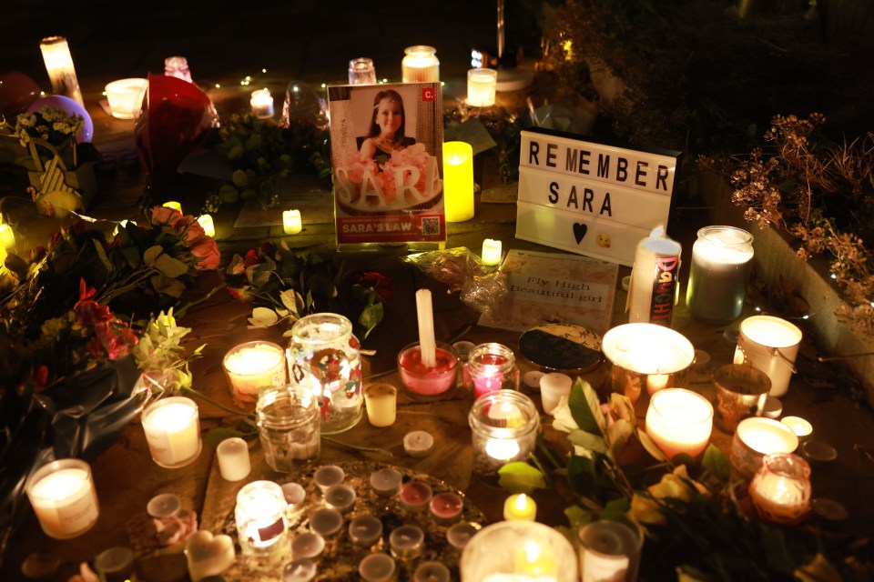 More than 100 people gathered outside the three-bedroom semi-detached home with candles and flowers to remember the ten-year-old