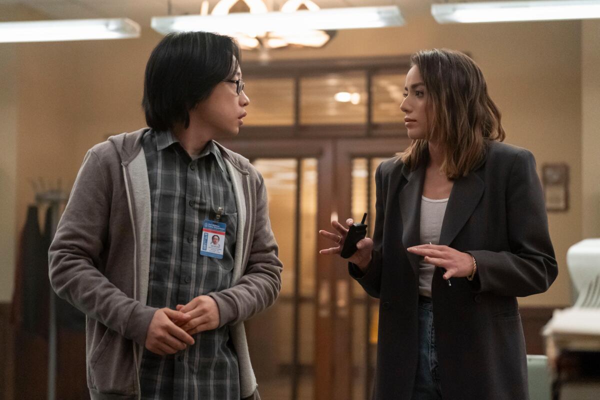 Jimmy O. Yang as Willis Wu and Chloe Bennet as Lana Lee in "Interior Chinatown."