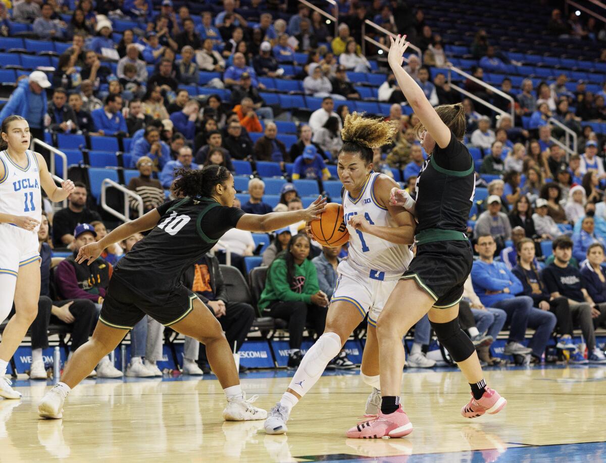 UCLA guard Kiki Rice drives to the basket in the second half.