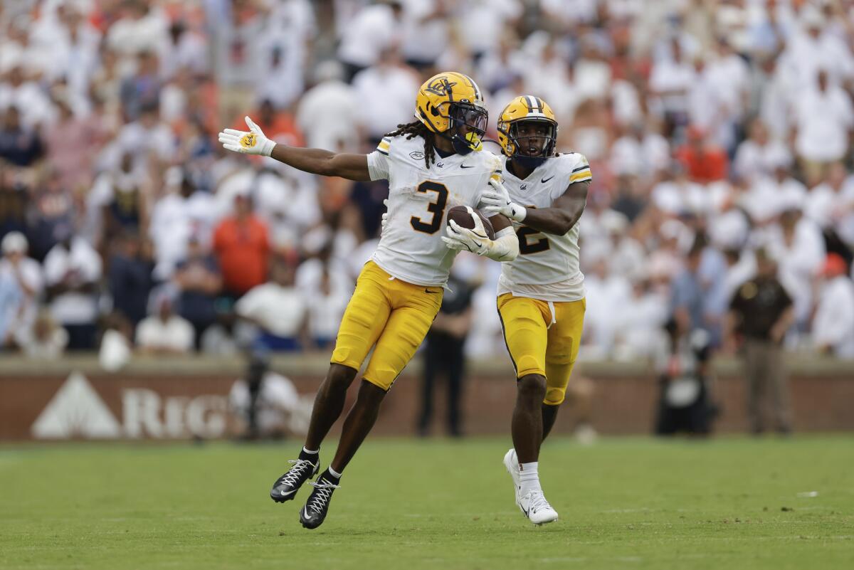 Cal's Nohl Williams celebrates his interception during the second half against Auburn in September.