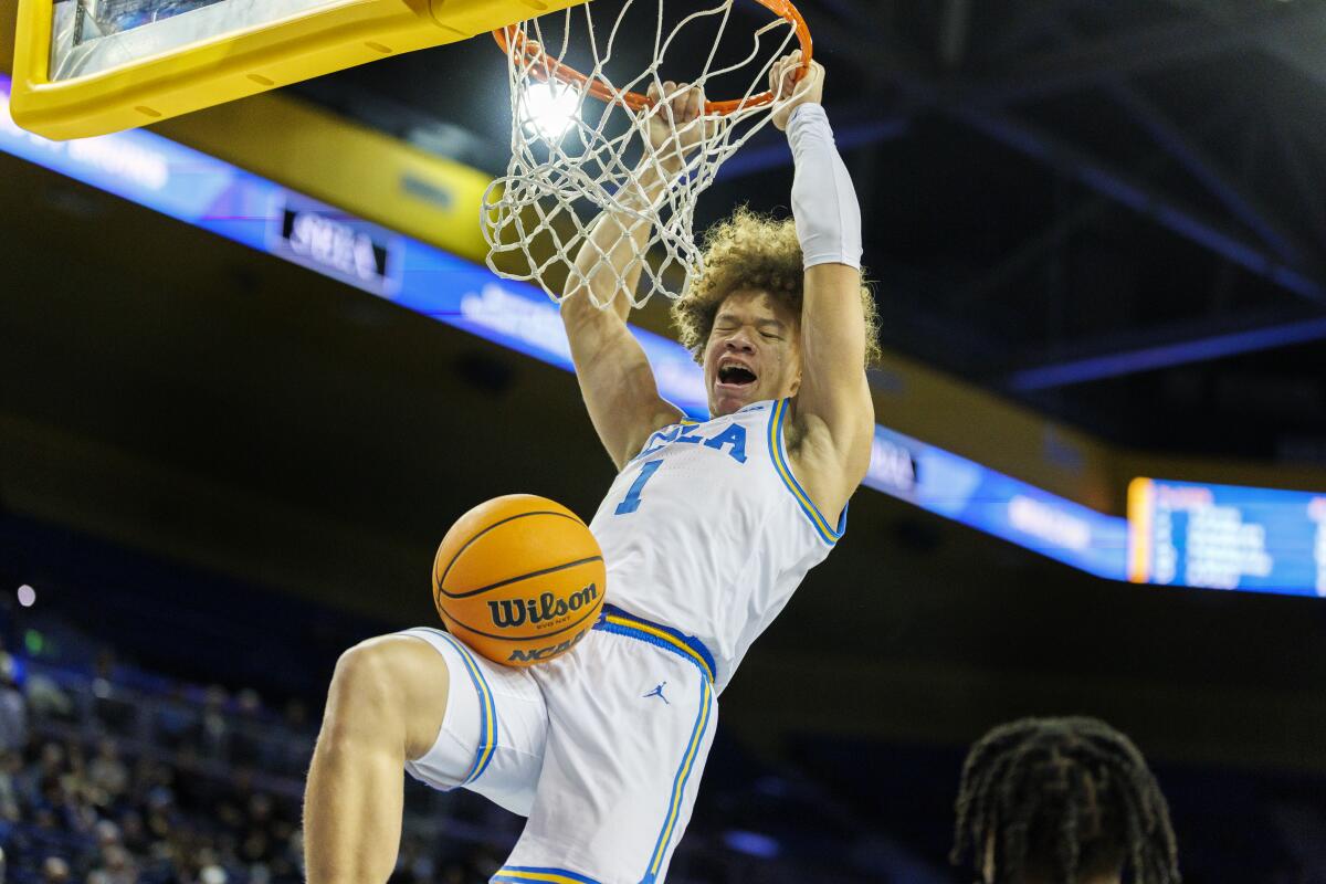 UCLA guard Trent Perry dunks on a fastbreak against Prairie View A&M in the second half.