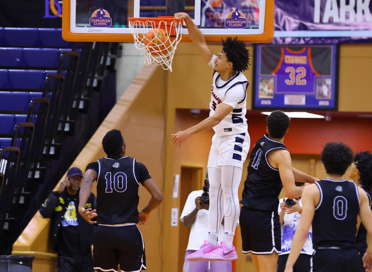 Brayden Burries of Eastvale Roosevelt with the dunk.