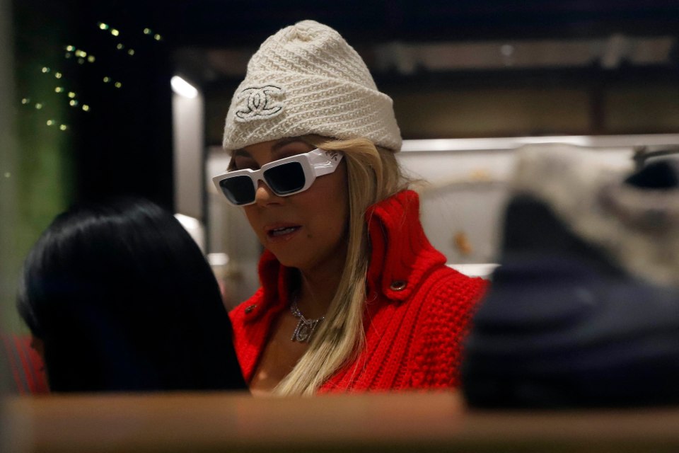 Mariah kept her shades on inside the store