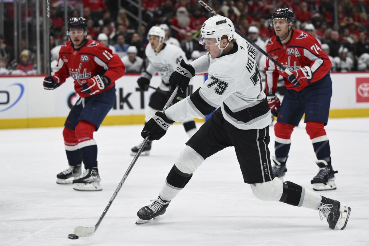 Kings center Samuel Helenius unleashes a shot during the second period of the game against the Capitals.