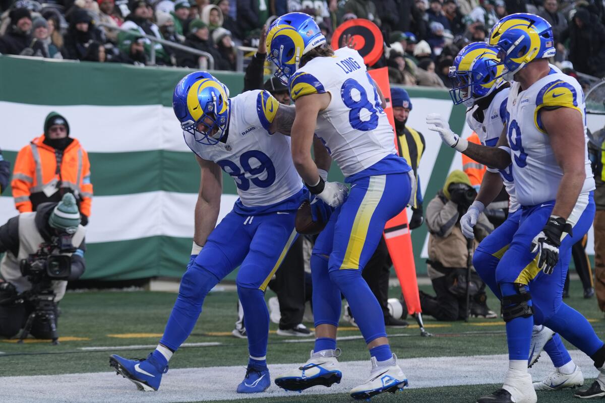 Rams tight end Tyler Higbee (89) dances in celebration after his deciding touchdown catch against the Jets.