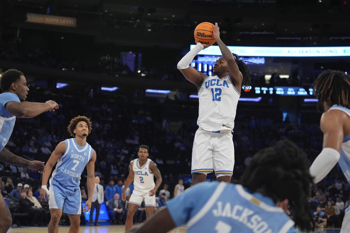 UCLA's Sebastian Mack shoots during the first half against North Carolina on Saturday.