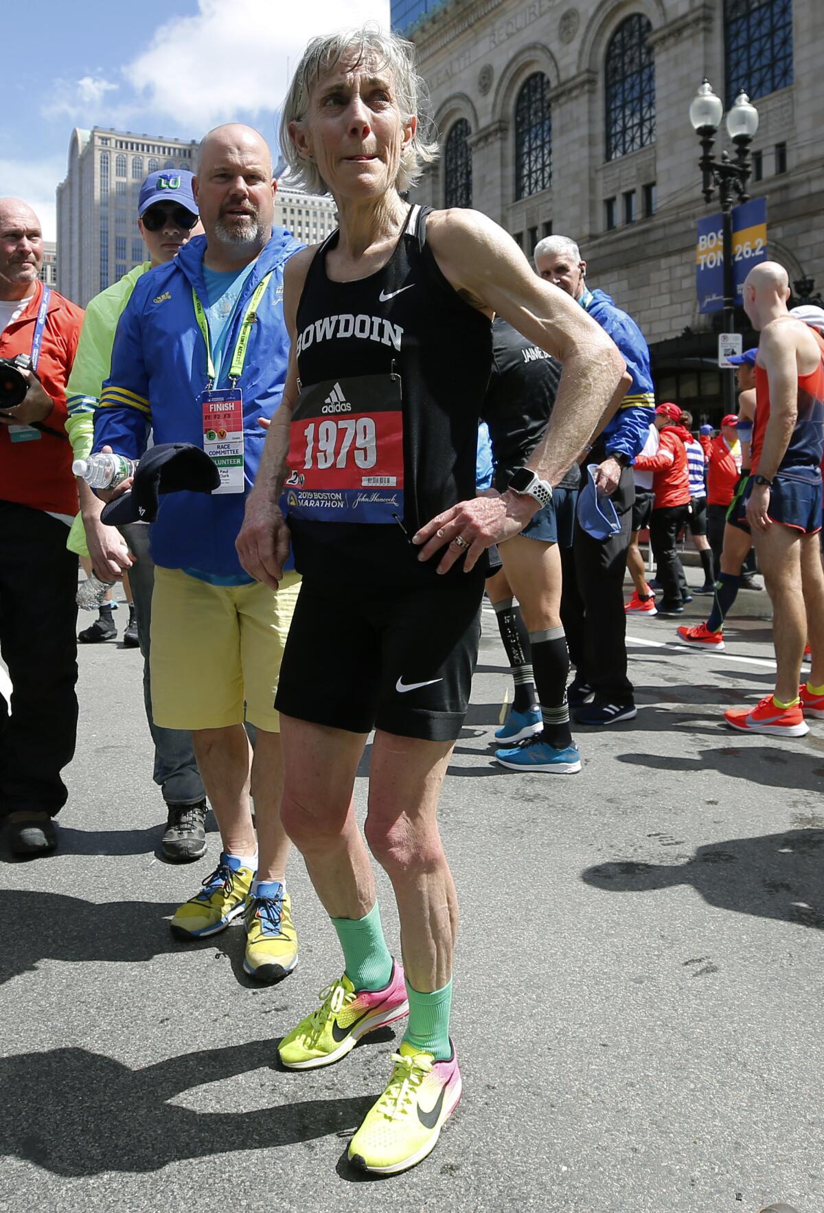 Joan Benoit Samuelson walks away from the finish line at the 2019 Boston Marathon.