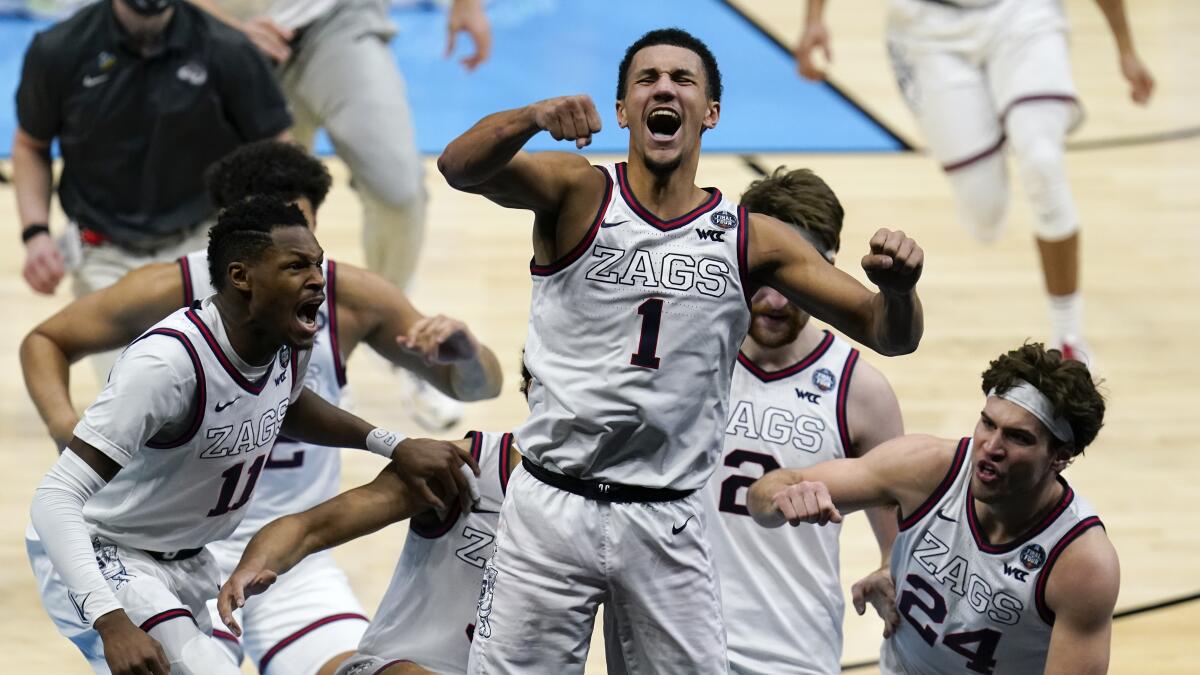 Gonzaga guard Jalen Suggs (1) celebrates making the game winning basket against UCLA during overtime.