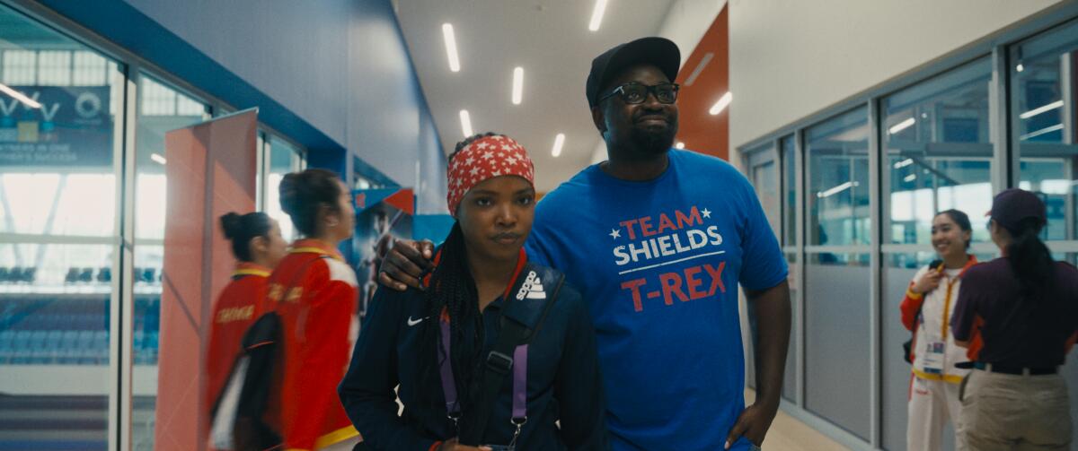 An athlete in a bandanna and her coach approach a moment of truth.