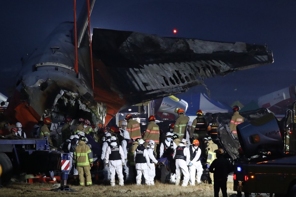 Emergency workers continued to comb through the wreckage into the night