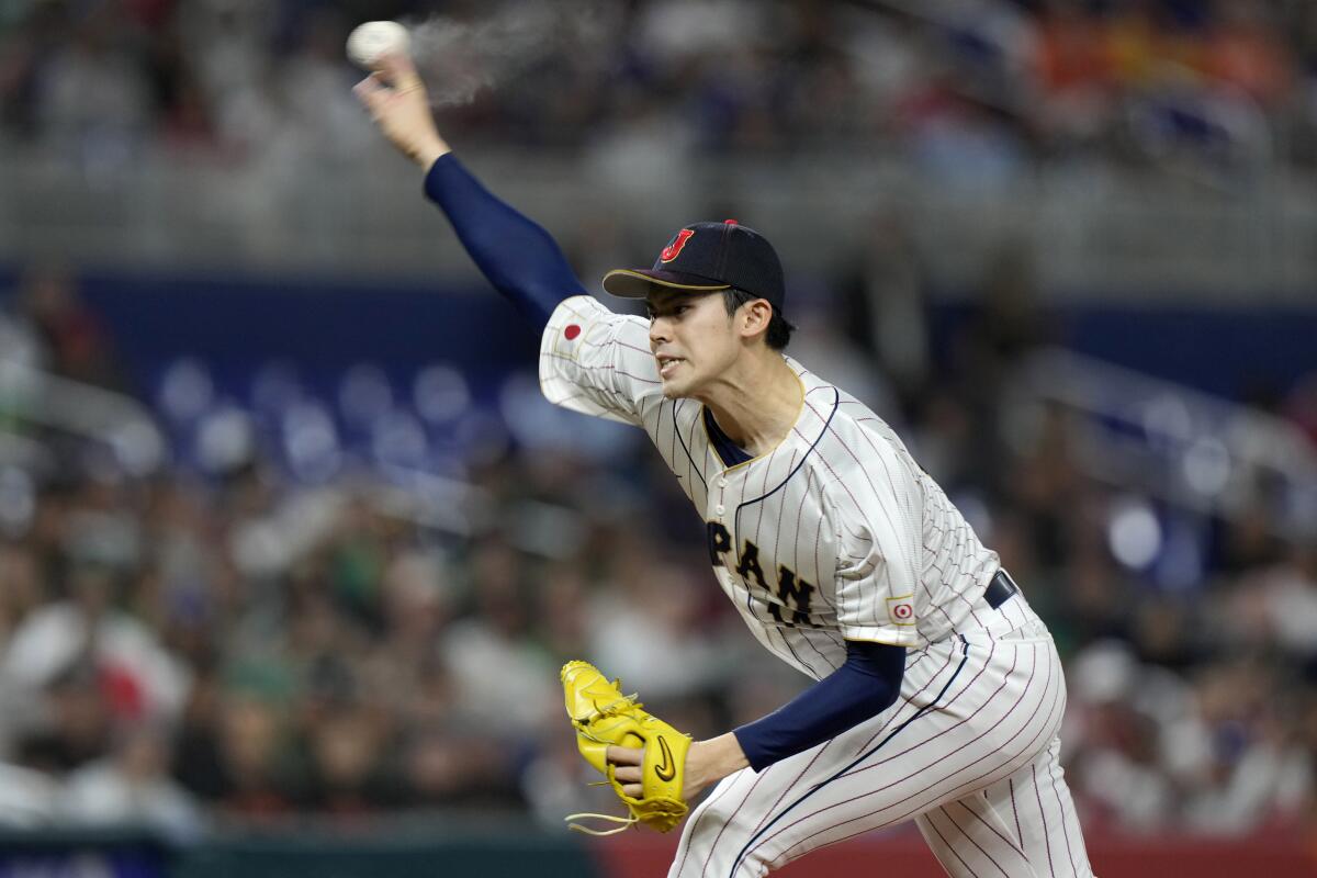 Japan's Roki Sasaki delivers a pitch during a World Baseball Classic game against Mexico in 2023.