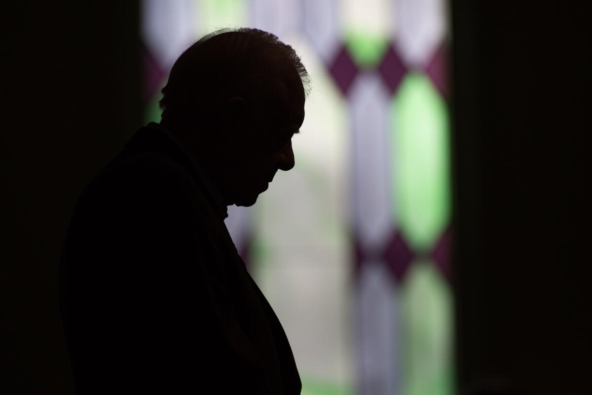 Former President Carter prays during Sunday school at Maranatha Baptist Church.