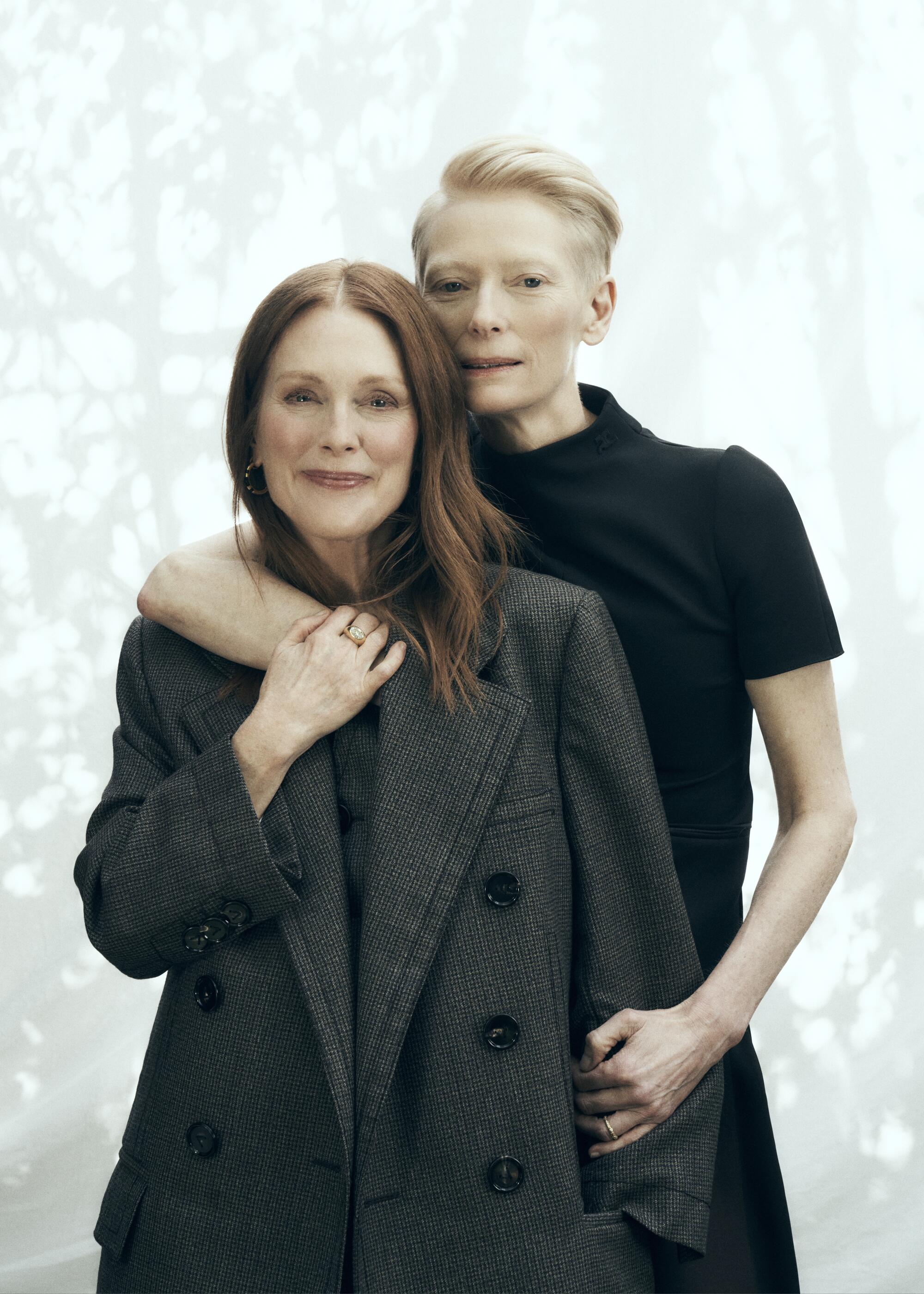 Julianne Moore and Tilda Swinton pose for a portrait.