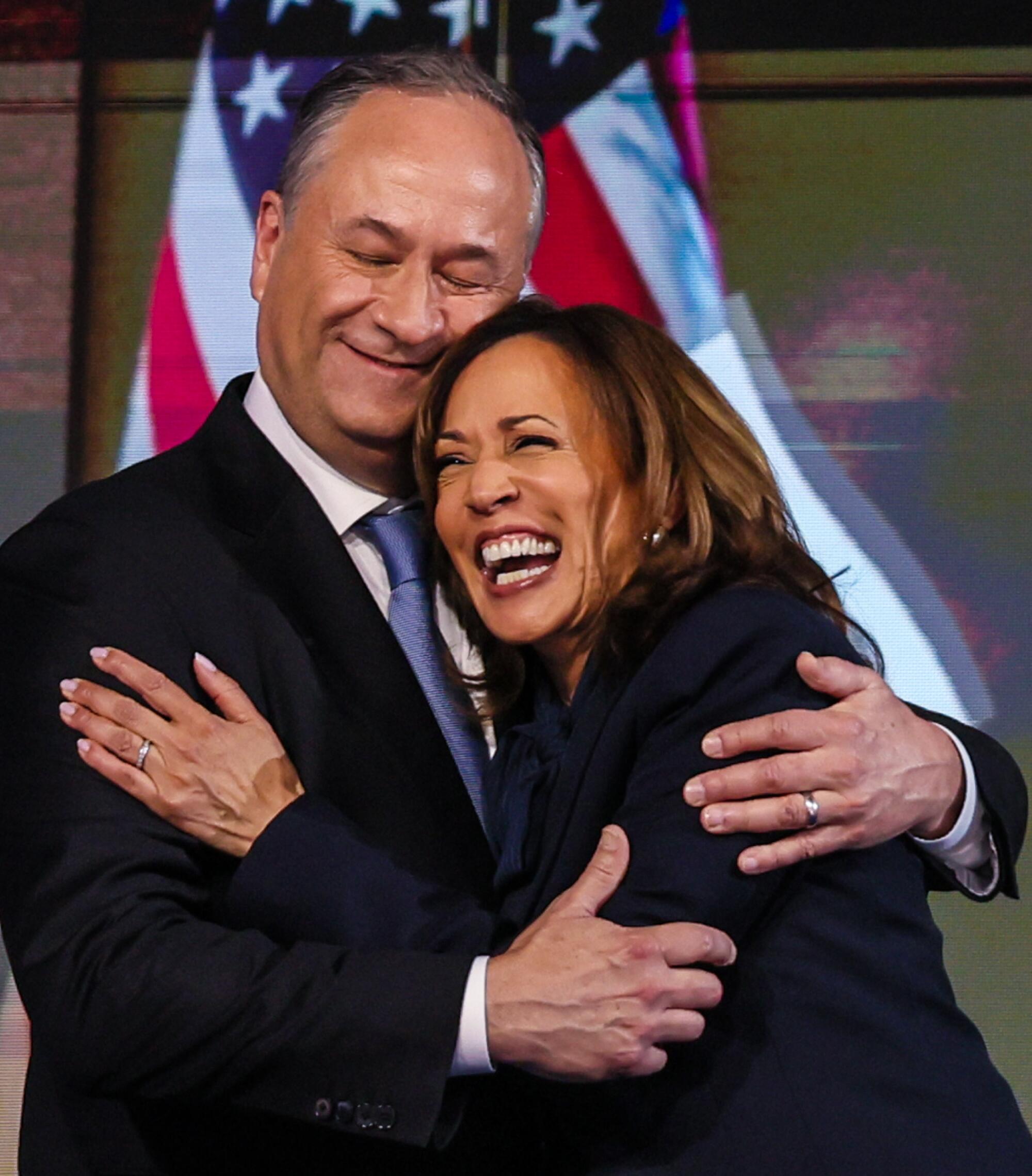 Vice President Kamala Harris embraces husband Doug Emhoff.