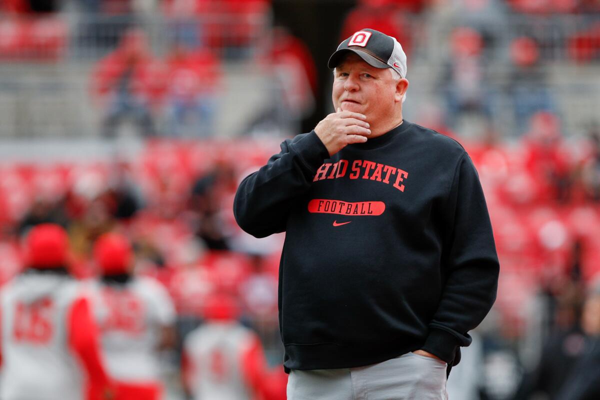 Ohio State offensive coordinator Chip Kelly stands on the field before a game against Indiana on Nov. 23.