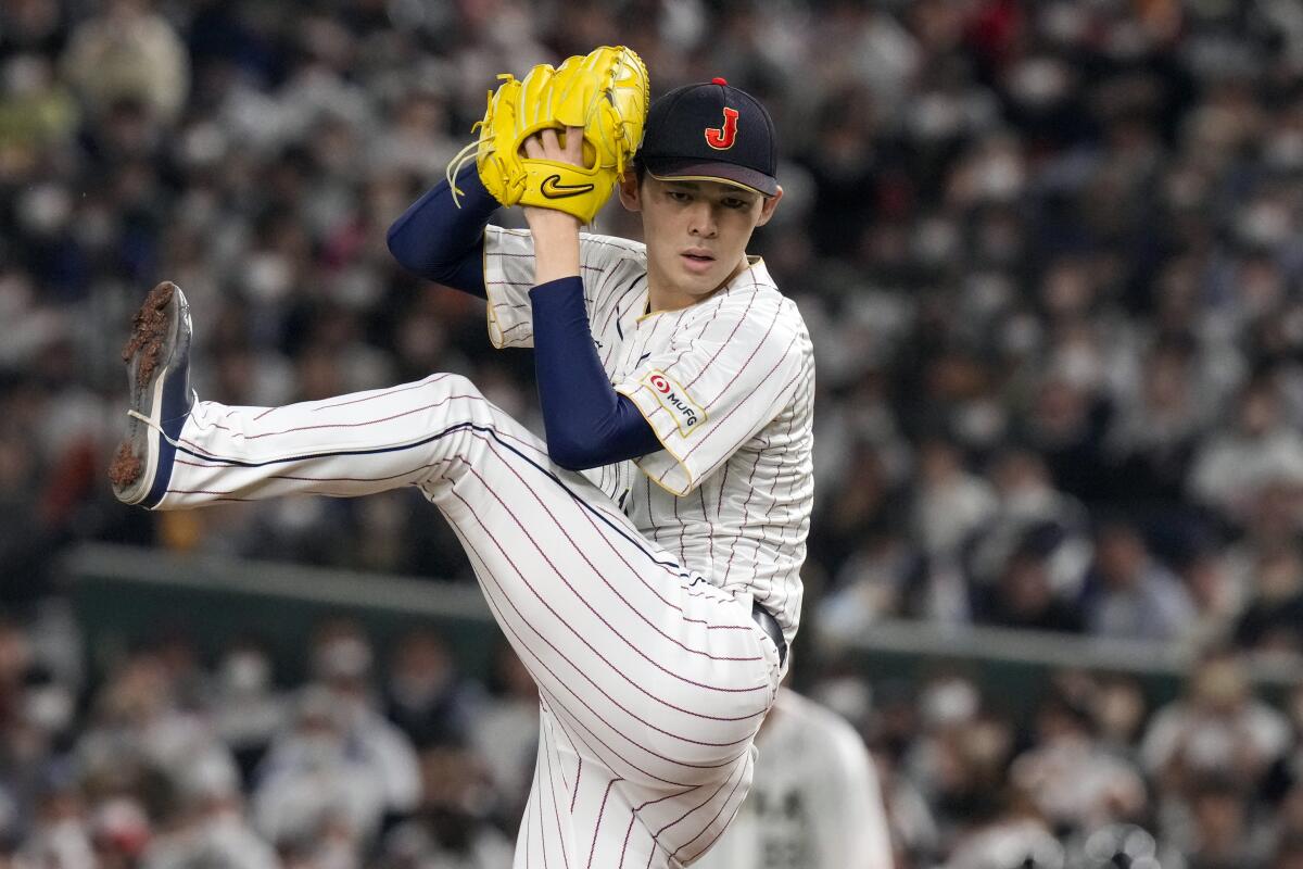 Roki Sasaki pitches for Japan in the World Baseball Classic in March 2023.