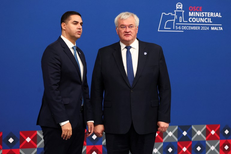 Malta's Deputy Prime Minister and Minister for Foreign Affairs and Tourism Ian Borg and Ukrainian Foreign Minister Andrii Sybiha attend the 31st Organization for Security and Co-operation in Europe (OSCE) Ministerial Council in Ta'Qali, Malta, December 5, 2024