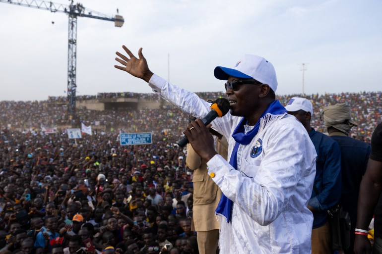 Suces Masra speaks at a campaign rally