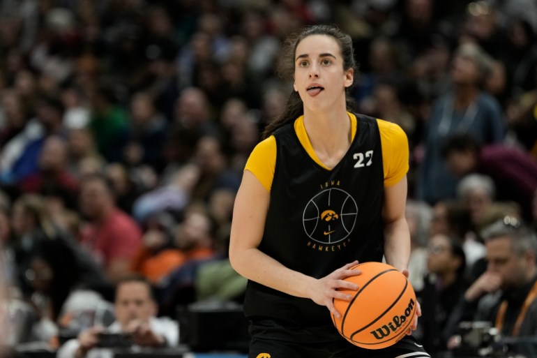 Iowa's Caitlin Clark shoots the basketball during practice.