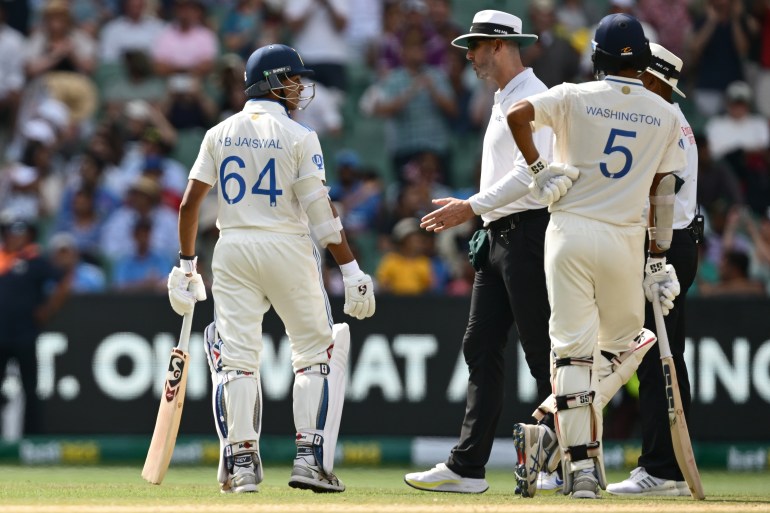 MELBOURNE, AUSTRALIA - DECEMBER 30: Yashasvi Jaiswal of India speaks with umpires Michael Gough and Joel Wilson during day five of the Men's Fourth Test Match in the series between Australia and India at Melbourne Cricket Ground on December 30, 2024 in Melbourne, Australia. (Photo by Quinn Rooney/Getty Images)